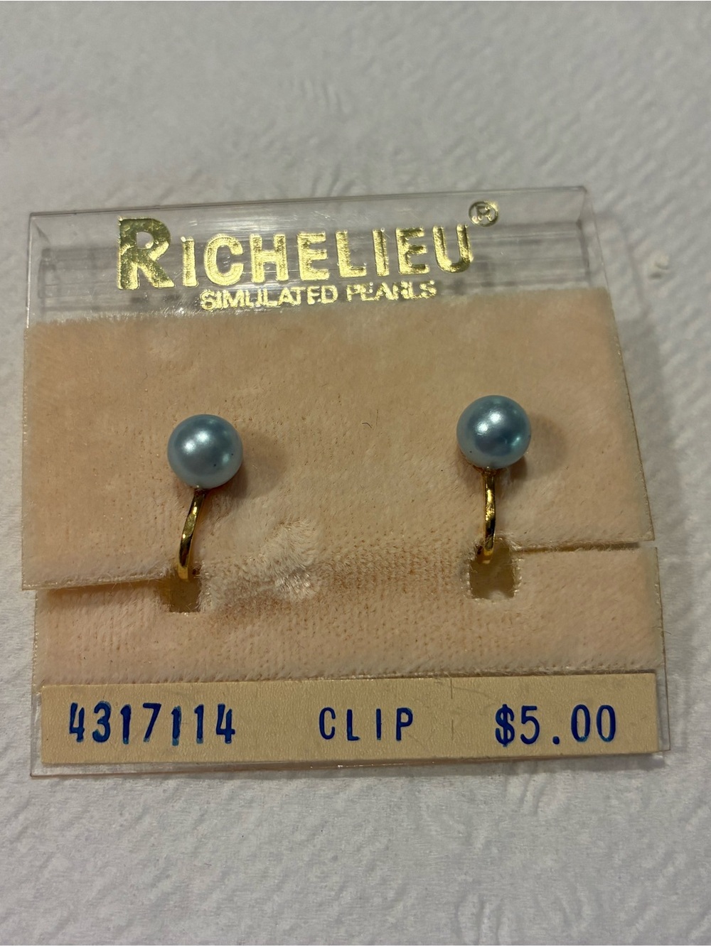 Women’s blue pearl clip on earrings
